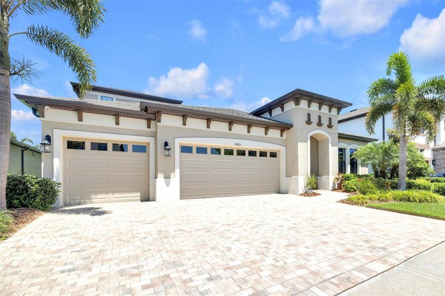Motivated Sellers!!! Welcome to 14610 Red Castle Ave — a former Homes by WestBay MODEL home featuring the stunning Swann IV floor plan, where luxury, craftsmanship, and thoughtful design come together beautifully. From the moment you arrive, the Mediterranean-inspired elevation, lush upgraded landscaping, and elegant paver driveway create unforgettable curb appeal. Inside, soaring 12-foot ceilings, 8-foot doors, custom wood trim details, and designer finishes throughout showcase the exceptional quality this home offers. At the heart of the home is a spectacular gourmet kitchen designed for entertaining, complete with an oversized island, upgraded high-end appliances, designer backsplash, abundant cabinetry, and an open-concept layout overlooking the spacious dining and grand living areas. Large windows frame stunning views of the custom pool and peaceful pond, creating the perfect backdrop for everyday living and gatherings alike. The luxurious primary suite offers a true retreat with a spa-inspired en-suite bathroom featuring dual vanities, an oversized walk-in shower, and a custom walk-in closet system. The main level also includes three additional generously sized bedrooms, two full bathrooms, a spacious laundry room with custom cabinetry, and a private office that can easily function as a sixth bedroom. Upstairs, you’ll find an incredible private guest retreat complete with a massive bonus room, full bathroom, and additional bedroom — ideal for guests, multi-generational living, or a media/game room setup. Step outside into your own backyard paradise featuring a custom-designed pool and spa, upgraded pavers, serene pond views, and plenty of space to relax and entertain. Additional upgrades include premium tile flooring, custom wood beam ceiling accents, designer bathroom fixtures, custom bedroom woodwork, partial fencing, generator connection, electric vehicle charging setup, and remote pool/spa controls. Located in the highly sought-after Hawkstone community, residents enjoy resort-style amenities, convenient access to shopping, dining, hospitals, major roadways, and top-rated schools. This exceptional home truly has too many upgrades to list and must be seen in person to fully appreciate.  ** Photos are from when owner occupied home. 48 hour notice for showings.