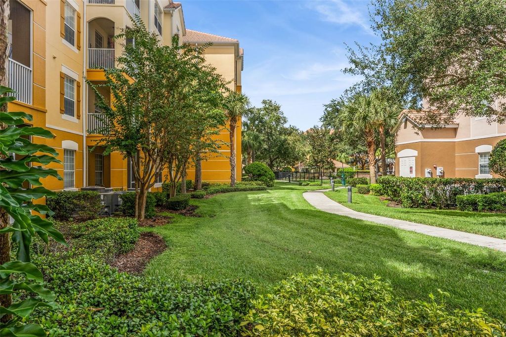 Photo of 3338 Robert Trent Jones Drive #307, Orlando, FL 32835 (MLS # O6349956)