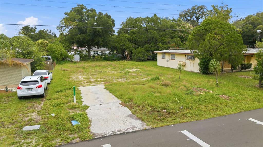Photo of 8714 N Hyaleah Road, Tampa, FL 33617 (MLS # TB8525450)