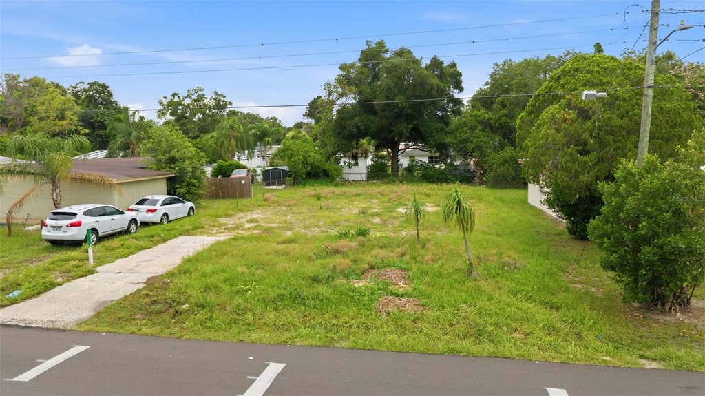 Photo of 8714 N Hyaleah Road, Tampa, FL 33617 (MLS # TB8525450)