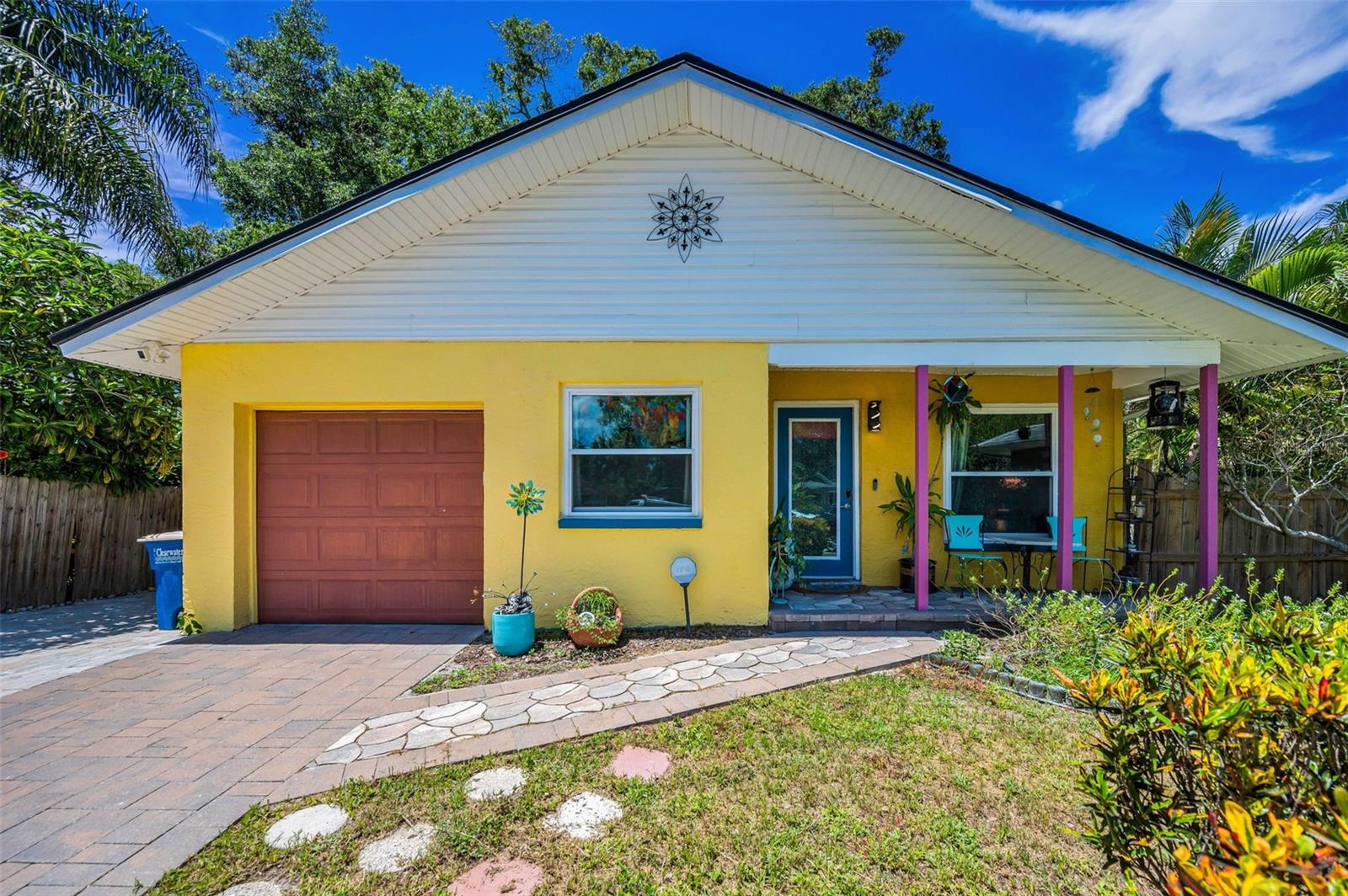 Love where you live! NO FLOOD ZONE! Charming three bedroom, 2 bath home with a backyard oasis. Room for additional parking on the extended pavered driveway. Inviting front porch greets you with landscaping and colorful accents. Inside you will find all new luxury vinyl flooring, new Simonton hurricane window and glass sliding doors. The Great Room has a dining area and pass thru to the kitchen. Cooks will love the new cabinets, stone counters and stainless appliances in the kitchen. The primary bedroom is a retreat. The ensuite bath includes new cabinets, defogging mirror and corner glass shower. There are 2 additional bedrooms and bath. Relax outside on the rebuilt vinyl floor patio with an aluminum roof cabana and paved grill area. Take a dip in the above ground pool or play in the fenced in back yard. Additional updates include the enclosed air conditioned laundry room, tankless water heater, industrial metal shed, all interior doors replaced and whole house water filtration on a monthly service system. Great location central to all Tampa Bay has to offer! There is nearby dining, shopping, banking and medical services. Easy access to the Pinellas Trail for bike rides or walking to Dunedin and downtown Clearwater. A short drive will take you to all area beaches, activities, sporting events and the Tampa International Airport. For more pictures, be sure to watch the video!