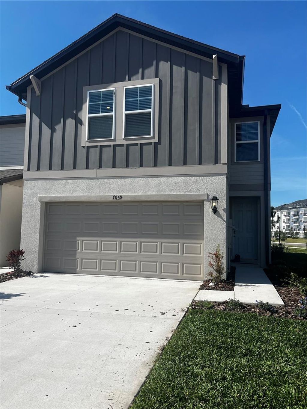 Photo of 7659 Momentum Parkway, Wesley Chapel, FL 33545 (MLS # J986334)