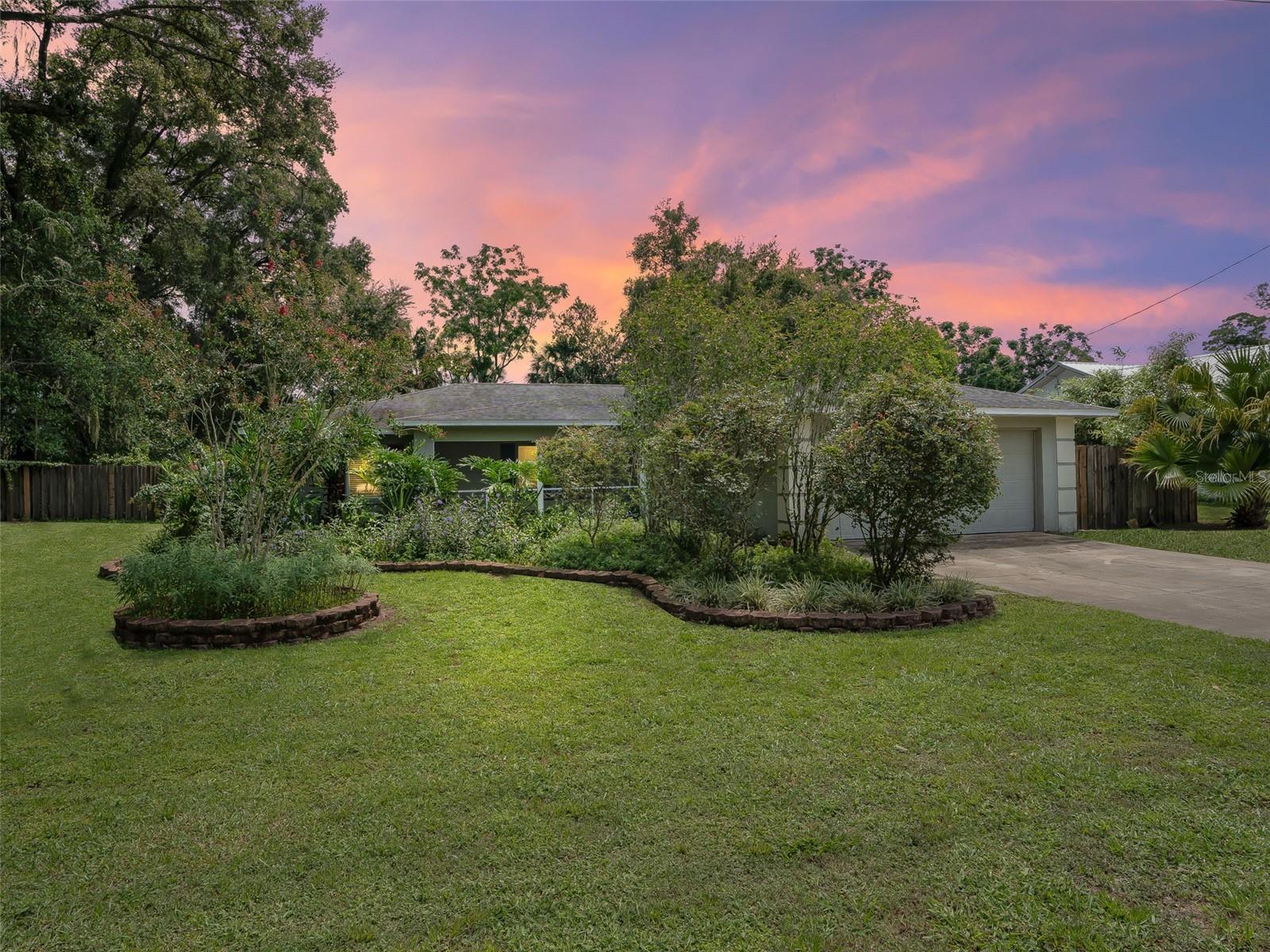 Conveniently located between The Villages and Ocala is this 3-Bedroom 2 Bath Home with Pool and Jacuzzi!
Welcome to this spacious and well-maintained concrete block stucco home, ideally located between The Villages and Ocala. Set on a beautifully landscaped lot with mature trees, this property offers comfort, privacy, and great amenities for Florida living.
Step inside to find a layout featuring high ceilings, and a mix of wood laminate, tile, and carpet flooring. A welcoming screened and covered front porch with a ceiling fan is perfect for enjoying your morning coffee.
The kitchen boasts stainless steel appliances, stone countertops, a closet pantry, and crown-topped cabinetry. Conveniently located between the kitchen and the great room, the dining area provides a functional space for both everyday meals and entertaining.
The split-bedroom floor plan ensures privacy, with the spacious master suite offering a walk-in shower and a generous walk-in closet. Two additional bedrooms and a second full bath are located on the opposite side of the home, each with ample closet space.
French doors lead out to your private backyard oasis—featuring an in-ground pool with a jacuzzi, all enclosed in a screened birdcage. Beyond, a fenced yard offers additional outdoor space for pets, gardening, or play.
A large indoor laundry room provides plenty of storage and workspace. The home is being sold partially furnished, offering a move-in-ready option for the next lucky owner.
Don’t miss this opportunity to own a piece of paradise in a prime location—schedule your showing today!