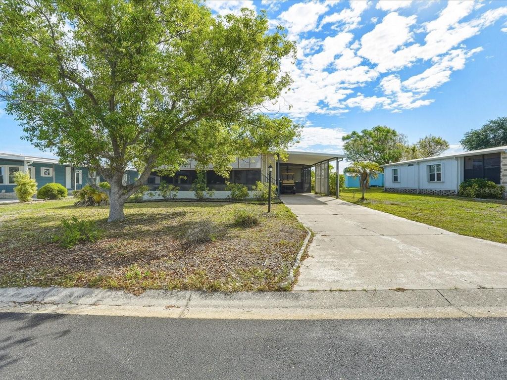 Photo of 6144 Redwing Avenue, Englewood, FL 34224 (MLS # C7525104)