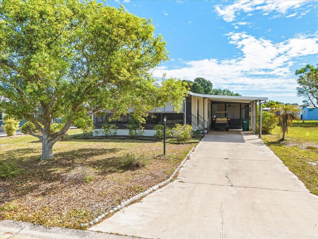 Photo of 6144 Redwing Avenue, Englewood, FL 34224 (MLS # C7525104)