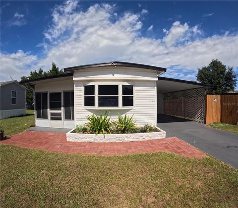 Photo of 29163 Heckleman Street, Brooksville, FL 34602 (MLS # TB8437044)