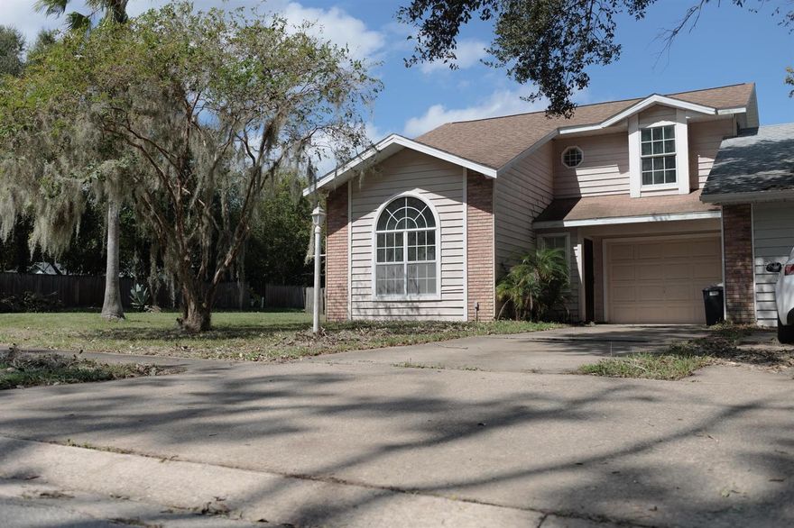 This adorable 3 bedroom 2.5 bathroom end unit townhome is located in a very private but convenient part of Port Orange with NO HOA!! Situated on a huge corner lot this 2 story home boasts massive ceilings and open concept. Downstairs has a spacious living room that looks into the quaint kitchen. There is also a bedroom and half bath room located on the first floor. Upstairs has two more bedrooms each with an attached bathroom and walk in closet. This cute home is just waiting for you to move in! Schedule a showing with me today! All measurements to be verified by the buyer. ;Water: City