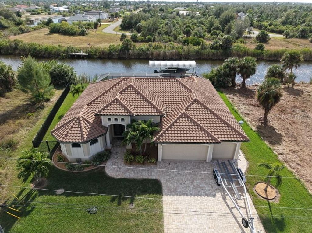 Photo of 9572 President Circle, Port Charlotte, FL 33981 (MLS # A4674711)