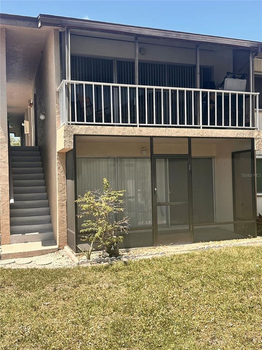 Bottom floor end unit with updated kitchen and bath.  Nice open layout with kitchen overlooking the living room and outdoor Florida room. #06398108,#06399746, #06399693, #06399737 #06398095
