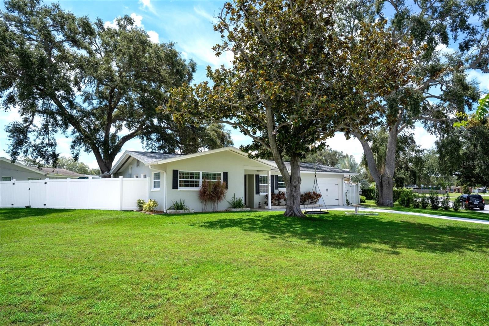 This home checks all the boxes—and then some! Step inside to a light-filled interior where the remodeled kitchen shines with modern finishes and the brand new bathroom adds a touch of luxury. The brand new air conditioner and AC ducts ensure comfort year-round, while the extremely large great room offers endless possibilities for entertaining and everyday living.
Outside, you’ll fall in love with the beautiful tropical, lush landscaping that turns the backyard into a private retreat. Enjoy the new PVC vinyl fence for privacy and the new deck for hosting friends or simply relaxing in the shade.
One of the home’s most treasured features? The neighbors. This is a friendly, welcoming community where people look out for one another, wave from their porches, and gather for casual chats along the wide, quiet streets. It’s the kind of neighborhood that’s hard to find and even harder to leave.
All of this is nestled in a convenient location close to charming local shops, great dining, and outdoor recreation. Close to historic downtown Dunedin with 39 restaurants, 9 breweries, an awesome marina sitting on the intra-coastal waterway of St. Joseph’s Sound, the Blue Jays Stadium, just across from the Pinellas Bicycle Trail going two directions to Tarpon Springs to the north and St. Pete to the south, close to an 18-hole golf course, and a short distance to three renowned beaches—Honeymoon Island, Caladesi Island, and Clearwater Beach! ** All Information Is Deemed Accurate - Buyer To Verify **