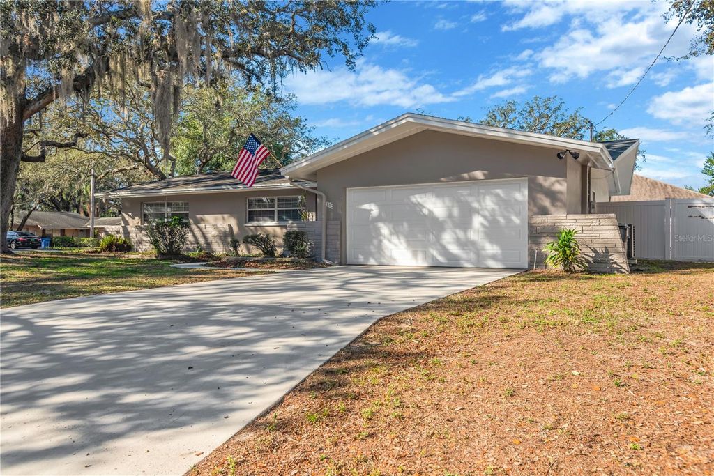 Photo of 7102 Woodfield Drive, Tampa, FL 33617 (MLS # TB8468022)