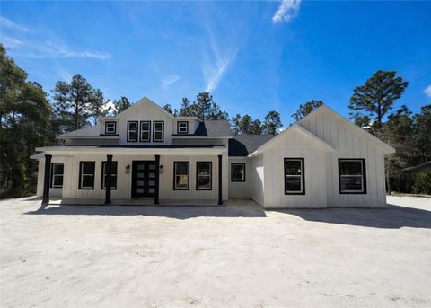 Photo of 2207 County Road 243e, Wildwood, FL 34785 (MLS # W7880886)