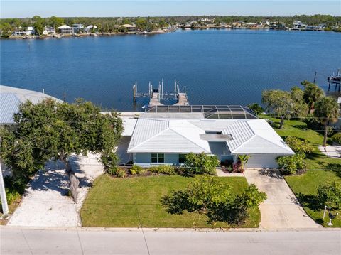 Photo of 5027 Waterside Drive, Port Richey, FL 34668 (MLS # TB8447506)
