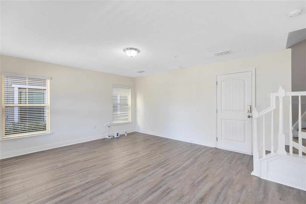 Photo of 10033 Town Lake Dr, Orlando, FL 32832 (MLS # O6378416)