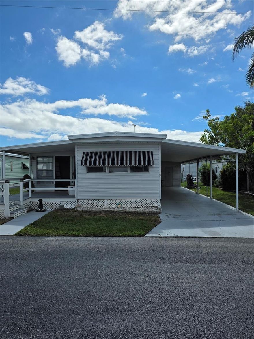 CORPORATE OWNERSHIP, AN LLC, OR A PARTNERSHIP IS PROHIBITED. NO SELLER FINANCING AVAILABLE. This property was flooded and had some wind damage by the 2024 hurricanes. The the condition is reflected in the reduced asking price. This home has great potential either as a fixer upper or this would also be a prime location for your new home! Plan a visit to Bay Aristocrat Village just to check out this waterfront community and the warm beautiful Florida waterfront lifestyle! The low monthly maintenance fee of only $360 includes lawn, trash, water and sewer. Located in beautiful Bay Aristocrat Village, one of Pinellas County's premier waterfront manufactured home communities, where you are a property owner, not a renter. This is an age 55 and over retirement community with many features such as a heated pool, Jacuzzi, shuffleboard courts, and clubhouse with varied scheduled activities and two fishing piers right on Tampa Bay. Bay Aristocrat Village is conveniently located just minutes from world famous Clearwater Beach, several high-end shopping malls, restaurants, major hospitals and two international airports. The asking price of the home includes the land share value. Only one cat per home is allowed. No dogs allowed. Contact community office regarding (ESA) pets. CORPORATE OWNERSHIP, AN LLC, OR A PARTNERSHIP IS PROHIBITED