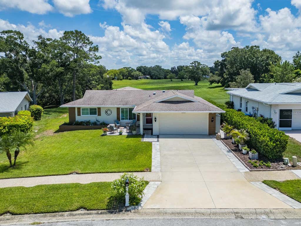 Photo of 1207 Timberbrooke Drive, Palm Harbor, FL 34684 (MLS # TB8539457)
