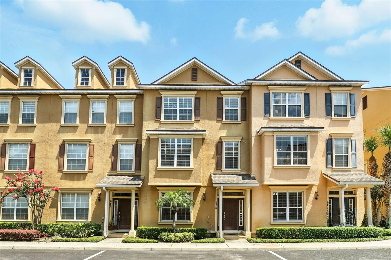 Stunning three story Lake Mary townhome! 4 Bedrooms(2 suites), 1 suite is on the first floor, 3 full Baths & 1 half Bath. Located in the desirable Timacuan Park Community. Upon entering the lovely Foyer, you will find a bedroom with a full bathroom suite on the first floor, great for in-law suite, Guest Bedroom, or Home Office complete with a FULL Bath. Heading up to the second floor you walk into a HUGE OPEN FLOOR PLAN w/ tons of natural light. The Kitchen features a Breakfast Bar, Granite counter tops, large Pantry & a private Balcony where you can relax or grill. The sitting area by the window creates cozy feeling, and the built-in cabinets around the sitting area give you extra storage. The 3rd Floor features the Main Owner's Suite with its own private bathroom and balcony to enjoy a cup of coffee in the morning or relax in the evening watching sunset with glass of wine. On the third also comes with two other Bedrooms and another full Bathroom & Laundry Room. Home features 2 AC Units, Washer & Dryer, deep 2 car garage w/ two storage closets. Community amenities include a large pool, as well as landscape and exterior maintenance. All conveniently located just minutes to shopping, dining, Seminole Town Center, Colonial Town Park, Orlando Health New Hospital, Advent Health Imaging Center and New ER. The Seminole walking/biking trail, I-4, 417 exchange & literally a 5-minute walk to Publix: A-rated Seminole County Schools. Call for a showing today!