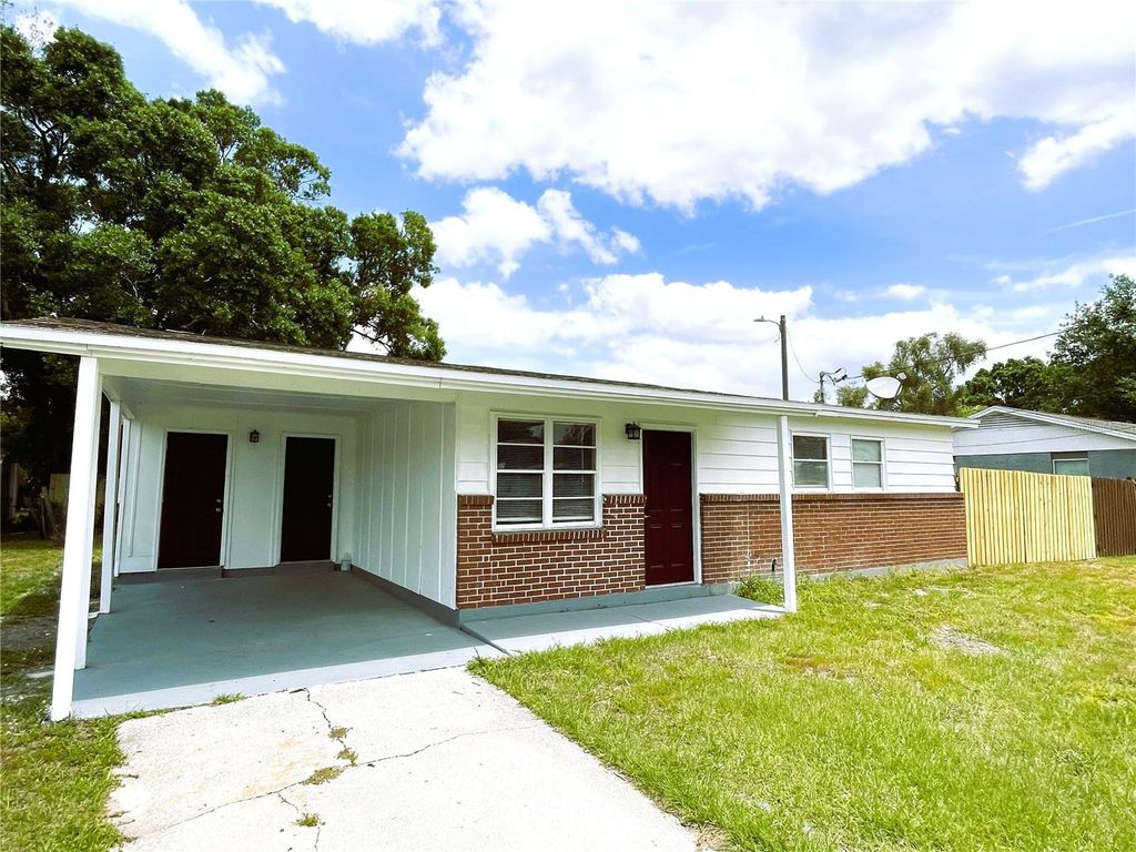 Photo of 8310 Croton Avenue, Tampa, FL 33619 (MLS # TB8478876)