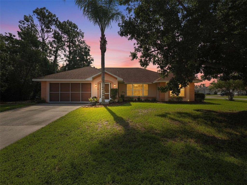 Photo of 11154 Tuscanny Avenue, Spring Hill, FL 34608 (MLS # W7889389)