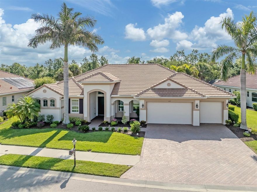 Welcome to this exceptional WCI-built Cambio model residence, ideally on one of the premier homesites in the Venetian Golf and River Club, offering peaceful views that stretch across the natural preserve of Myakka River Park Preserve. Designed with comfort and elegance in mind, this custom home features four bedrooms, three full baths, a family room and formal living/great room, den plus an oversized 3 car garage. From moment you enter through the leaded glass doors, you’ll notice the attention to detail, including crown molding, tray ceilings and numerous custom upgrades throughout which include new electrical solar panel 2017, Solar pool panels in 2026, color mood lighting for the pool (2025). New A/C for the Primary Suite side of the home (2025), NEW ROOF 2024 Including Tube Lighting in the Kitchen. Roof has a 30 year transferred able warranty. The open-concept kitchen is beautifully appointed with tall maple cabinetry, quartz countertops, a breakfast bar, stainless steel appliances, and a casual dining area overlooking the pool and preserve. The expansive living area flows seamlessly through pocketing sliding glass doors to the outdoor living space, where you’ll find a heated saltwater pool and spa, ideal for entertaining or enjoying breathtaking sunrise views. The bright and spacious primary suite includes dual walk-in closets and a luxurious bath with a soaking tub, dual vanities and walk-in shower. Residents of this gated, guarded community enjoy an impressive array of amenities, including pickleball courts, six Har-Tru lighted tennis courts, a resort-style pool, lap pool, fitness center, tiki bar and fine dining restaurant. The clubhouse also hosts a variety of social events and activities. The community provides access to a 70-acre nature park along the Myakka River, featuring walking trails, a boardwalk and a canoe launch. The 18-hole championship golf course, designed by Chip Powell, is highly regarded, with optional membership available. Conveniently near Interstate 75, Sarasota Memorial Hospital–Venice, downtown Venice and Gulf beaches, this home offers luxury and accessibility. Venice Island’s charming, accessible downtown features boutique shopping, dining and cultural attractions, making this property an outstanding opportunity to enjoy living the Florida lifestyle.