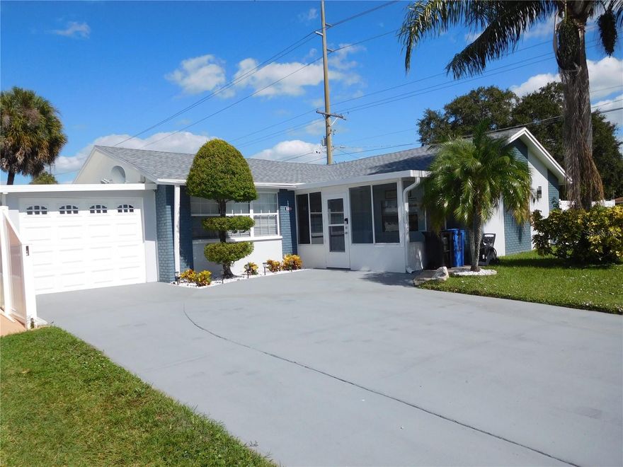 Come see this exceptional and Remodeled Home located in the highly sought-after Town and Country Community located in Tampa Florida perfect for daily living, vacationing, Turnkey Investing and/or entertaining family and friends. This lovely Corner Lot boasts 3 Bedroom 3 Full Bathrooms, Work Office Denn, or possible Nursery Room and one Car Garage and an Attached Workshop Shed. Seller has made over 65k in upgrades in 2023 to include the following: A Newly installed Roof, Remodeled Kitchen with Stainless Steel Appliances, 3 fully Remodeled Bathrooms, New A/C and Hot Water heater, new Washer and Dryer, New Flooring throughout, new Lanai Sliding doors and Retractable Shades. Upgrades also include New Stylish Ceiling Fans, Interior and Exterior Painting, Knock Down Ceilings, Vinyl Privacy 6' Tall Fencing around the perimeter, New Keyless Entry Keypad and Ring Security Camera system. From the Dining room, you enter the kitchen and the Lanai area overlooking the large, picturesque backyard with Avocado, Orange, and Green Banana Trees to enjoy Florida Summers and quiet relaxation with family and friends. Town and Country is a "No HOA or CDD" community that boasts a tranquil neighborhood with easy access to Suncoast Hwy 589, 1275, 175 and 14. Closely located near Tampa and Clearwater Airports, MacDill Airforce Base, Bush Gardens, Raymond James Stadium, Amalie Arena, the Strawberry Festival, International, Westshore, and Citrus Park Malls and all within short distances to supermarkets, local restaurants, area shops, world class beaches and convenient Cruise Ports. This tucked away gem will not last long. Furnishings are separately negotiable.
