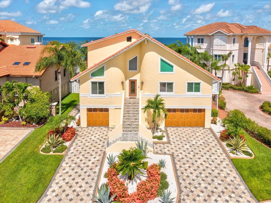 Nestled on a private, direct waterfront lot in Gulf Harbors, 5101 Westshore Drive presents an exceptional blend of elevated luxury, privacy, and sweeping Gulf views. Fully renovated and positioned well above the flood zone, this turnkey residence offers refined coastal living with every detail thoughtfully upgraded.
A newly constructed dock anchors the waterfront experience, featuring a 12,000-lb remote-controlled boat lift, dual jet-ski lift, reinforced seawall, and integrated drainage system. The outdoor living space is framed by meticulous landscaping and a resort-style saltwater pool with heating, cooling, and ambient lighting—ideal for both sunset entertaining and morning swims.
Inside, the open-concept layout is filled with natural light and enhanced by plantation shutters, custom tile medallions, and recessed lighting throughout. The chef’s kitchen showcases refined cabinetry, Sub-Zero upgrades, under-cabinet lighting, and sightlines that capture stunning Gulf views from nearly every angle.
The primary suite and guest accommodations balance comfort and sophistication, while two spa-inspired bathrooms feature granite vanities, walk-in tile showers, Jacuzzi tubs with integrated lighting and sound, and soft-close fixtures. A dedicated laundry room adds convenience with granite countertops, front-loader risers, and generous storage.
Every mechanical and safety system has been modernized, including central HVAC with UV filtration, dual garage mini-splits, hurricane-rated doors and
Sources