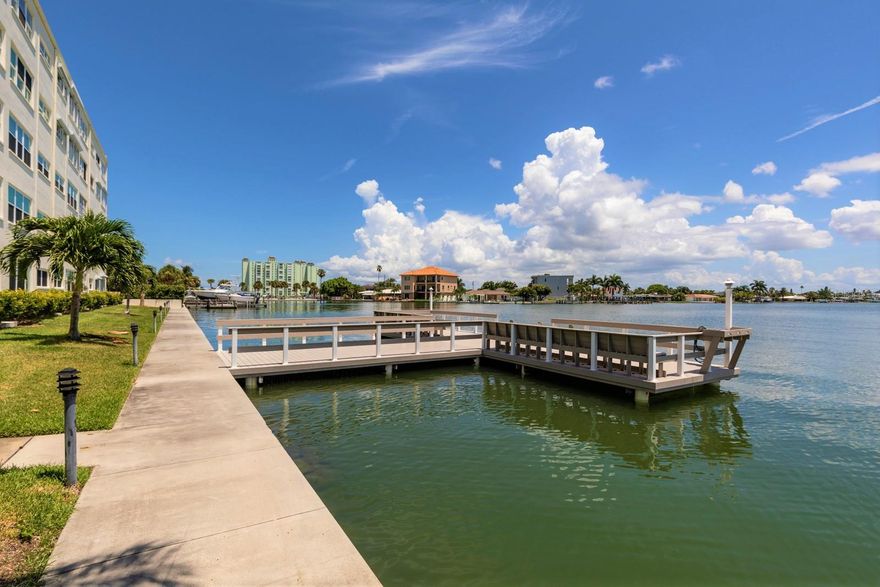 Regency West Condominiums is the Heart of St Pete Beach Beach to Bay! Unit 421, is a spacious 1145 sq ft. Built as 1 bedroom but you have 2 bedrooms as follows: the opening picture shows an open unhindered South West island view! Enjoy the Northern panoramic View from the Kitchen and front door!  Pop your beach chairs out any time and enjoy the breeze and panoramic island view. Note the ‘Wall of New Windows’ streams all daylight and views over the island and looks down on Regency’s Western Pool with clubhouse and amenities. Note the lovely windows keep your Electric bills consistently low.  Built as a 1 bedroom 1.5 ba but a huge OPEN Florida Room, long enclosed useful as a Guest Room with a Murphy Bed, a walk-in Closet/ utility room, sliding glass pocket doors, plus Barn Doors for privacy if friends stay over. You will love sleeping with its Gulf Breezes, in either bedroom.
 Over half of the unit's include a Land lease monthly cost $272 pm. Call today. It may even include a Home Warranty!
