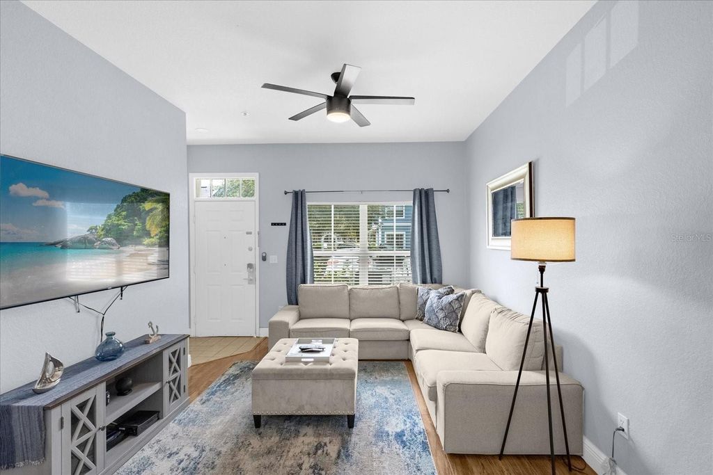 Photo of 2213 San Vittorino Circle #106, Kissimmee, FL 34741 (MLS # O6385402)