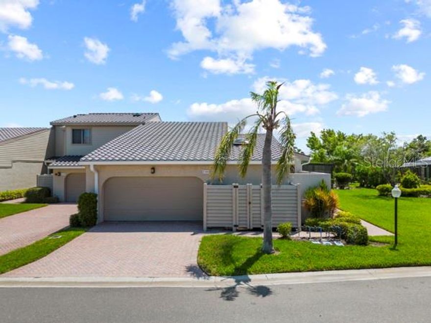 MOTIVATED SELLER! Experience the ultimate in island living in the highly sought-after and prestigious Harbor Oaks community on Longboat Key. This one-story, 3-bedroom, 2.5-bath residence spans 2,219 sq. ft. and offers a host of desirable features—including a private pool, 2-car garage, and deeded beach access through the exclusive Bay Isles Beach Club.

A new roof (2025) and fresh interior paint ensure peace of mind and a move-in-ready experience. High ceilings fill the home with natural light, enhancing the spacious feel throughout. The expansive living room, anchored by a wood-burning fireplace, seamlessly connects to the outdoor living area via pocket sliding glass doors, opening to two large screened lanais—ideal for both relaxing and entertaining.

The chef’s kitchen is outfitted with granite countertops, stainless steel appliances, rich wood cabinetry, a breakfast bar, and a skylight for added brightness. The primary suite is a private retreat featuring a walk-in closet, two additional closets, updated master bath, and sliding doors leading to the terrace. A guest suite with en suite bath provides comfort and privacy for visitors. Additional highlights include an interior laundry room with sink, a newer AC unit (2018), and natural gas line for adding a pool heater. All furnishings are included.

Residents of Harbour Oaks enjoy a resort-style lifestyle with access to a community pool, spa, and lushly landscaped surroundings—just minutes from Longboat Key’s vibrant Town Center. As part of Bay Isles, you’ll have exclusive access to the Bay Isles Beach Club, a private, gated Gulf-front oasis with a pavilion, picnic areas, BBQ grills, beach chairs, restrooms, and ample parking—perfect for sunset viewing or relaxing on Longboat Key’s pristine white sands. Optional membership opportunities at the Longboat Key Golf & Tennis Country Club and Harbourside Moorings deep-water slips offer even more ways to elevate your coastal lifestyle.