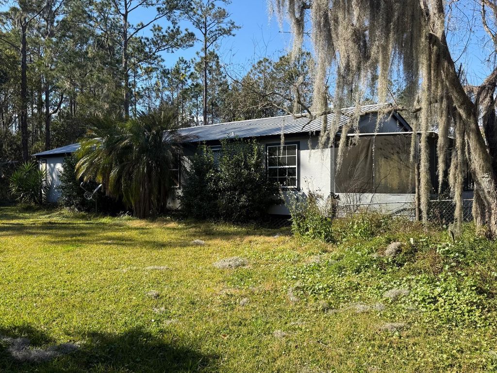Photo of 116 Stone Farm Road, East Palatka, FL 32131 (MLS # FC315593)