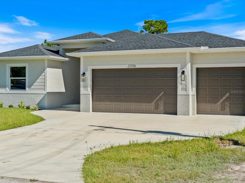 Photo of 13356 Rayburn Lane, Port Charlotte, FL 33981 (MLS # C7504773)