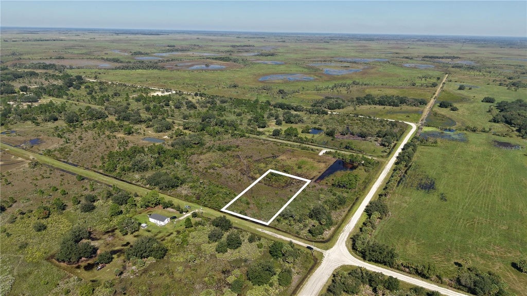 Photo of 16065 NW 316th St, Okeechobee, FL 34972 (MLS # O6450062)