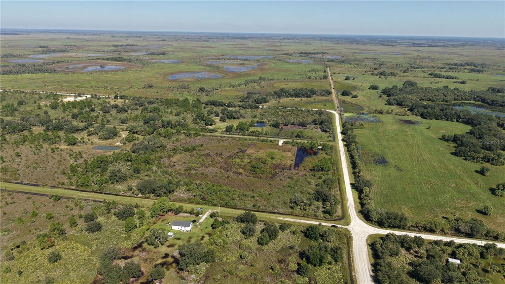 Photo of 16065 NW 316th St, Okeechobee, FL 34972 (MLS # O6450062)