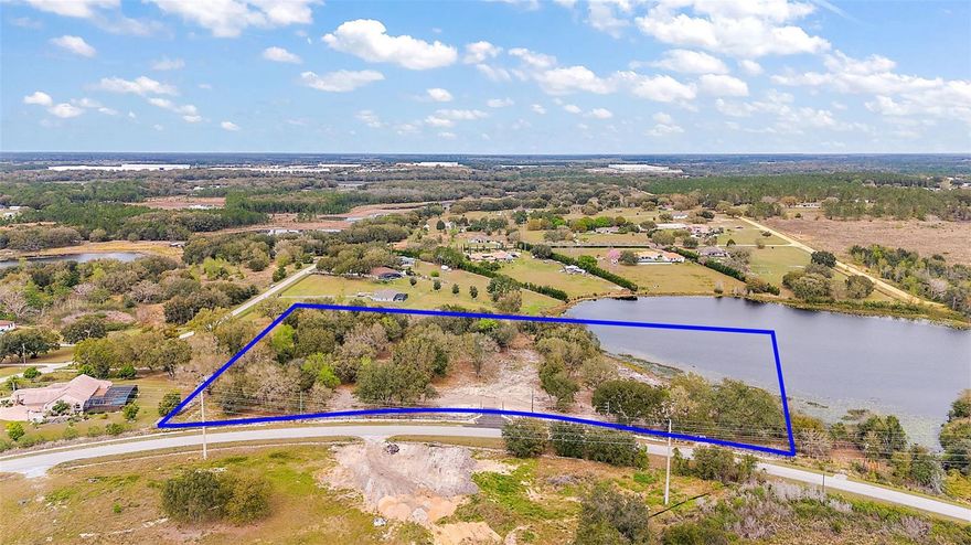 This waterfront property on Cherry Lake Rd offers an unparalleled opportunity to build your custom estate and is ready for your dream house. The property is 5.7 acres, fenced, with no HOA. It's convenient location offers access to Groveland, Minneola, Clermont, Hwy 19, Hwy 27, or the turnpike. Adjacent parcel(04-22-25-0002-000-02800, access from Coralwood Ln) is available as well.