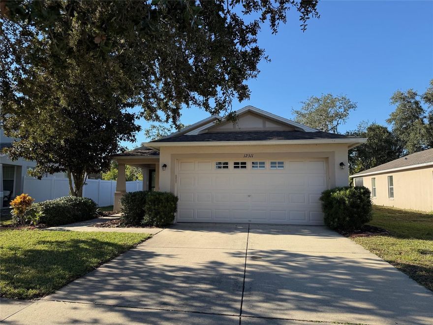 Move-in ready! This 3 bedroom, 2 bath home with a den (perfect for a 4th bedroom or office) has an open layout, wood laminate flooring, and a spacious kitchen with granite counters, plenty of cabinet space, and stainless steel appliances. Step outside the sliding doors just off the kitchen to your oversized screened lanai with peaceful conservation views, which means no rear neighbors, just nature. A split bedroom floor plan, ceiling fans in every room, and a 2-car garage add to the appeal. Conveniently located right off of the Suncoast Parkway, which makes commuting easy, just 30 minutes to Tampa International Airport, and close to the Suncoast Trail, as well as shopping, restaurants, and entertainment. Be sure to check this one out!