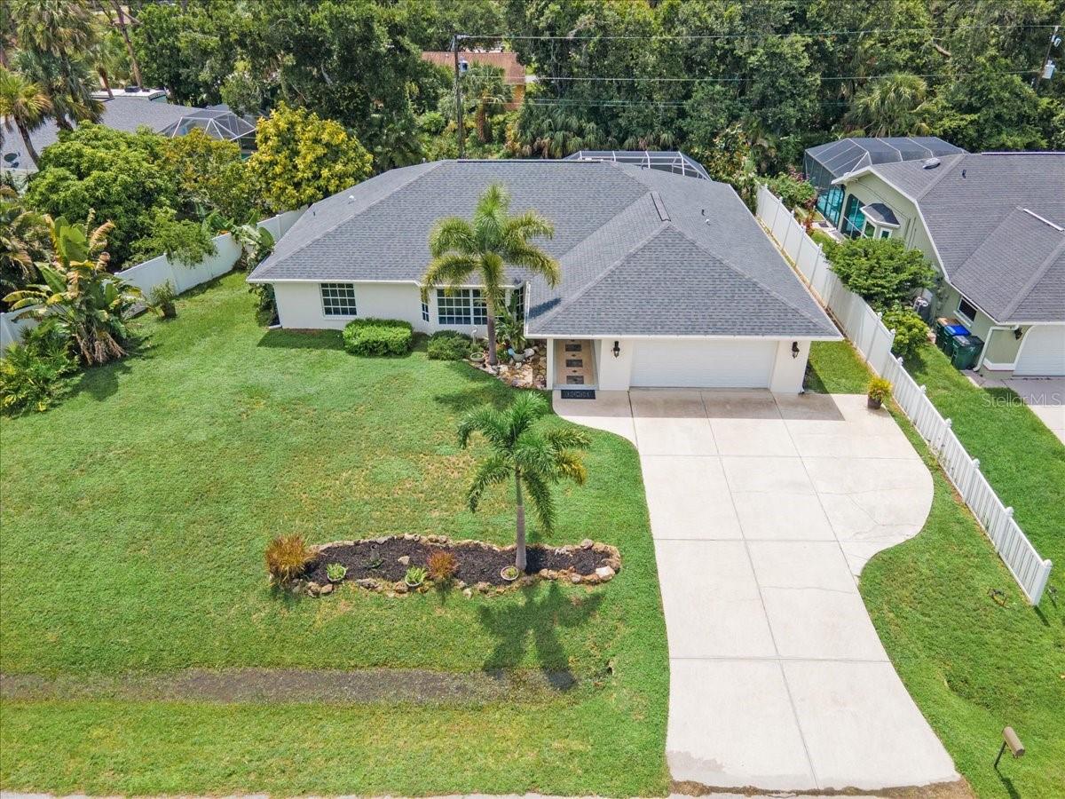 Step into your own private Florida retreat with this beautifully updated pool home in the heart of North Port. From the moment you walk in, you'll appreciate the open concept layout and stylish luxury vinyl plank flooring that flows throughout the entire home. It's easy to maintain and ideal for everyday Florida living.
The completely remodeled kitchen is a true standout, featuring quartz countertops, new stainless steel appliances, a walk-in pantry closet, coffee station, and a large island with room for seating. Whether you're hosting guests or enjoying a quiet morning, this kitchen delivers both form and function.
The flexible floor plan is designed to fit your lifestyle with room to grow, work, or relax. The spacious primary suite includes large walk-in closets and an en-suite bathroom with updated double vanities, a shower and tub combination, and a linen closet for added storage.
On the opposite side of the home, you'll find a private guest bedroom and an updated bathroom with a walk-in shower and new vanity top. This bathroom also offers convenient access to the pool, making it ideal for visitors or everyday use.
Step outside and discover your personal backyard oasis. The screened lanai features a large under-cover seating area, perfect for relaxing out of the sun or entertaining by the pool. Both the pool deck and the pool surface have been recently refinished, creating a fresh and inviting outdoor space.
A spacious indoor laundry room offers additional storage or could serve as an extra pantry area. Every detail of this home has been thoughtfully upgraded for comfort and convenience.
Located close to shopping, dining, schools, and everything North Port has to offer, this move-in ready home is perfect for anyone looking to enjoy the Florida lifestyle with the benefit of a private pool. Don't miss the opportunity to make it yours.