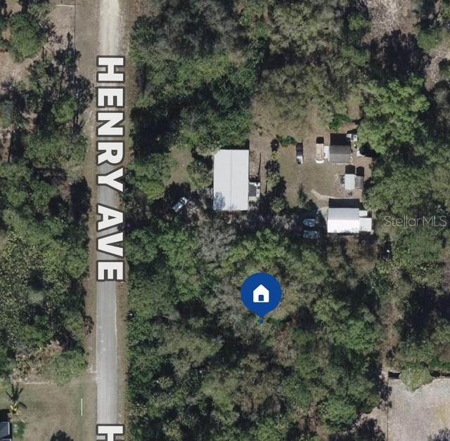 Discover the perfect canvas for your dream home on this spacious 1/2 acre lot! This prime piece of land offers a fantastic opportunity to create a personalized sanctuary tailored to your lifestyle. Conveniently located near major highways, you'll enjoy easy access to commuting routes, making daily travel a breeze. Additionally, a variety of shopping options are just moments away, providing all the amenities you need within reach. Imagine the possibilities as you design your ideal living space in this desirable location, surrounded by the perfect blend of convenience and tranquility. Don’t miss out on this exceptional opportunity to build your future!