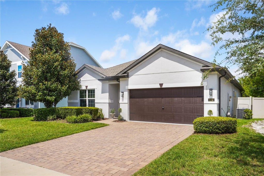 Photo of 154 Oakmont Reserve Circle, Longwood, FL 32750 (MLS # O6440507)