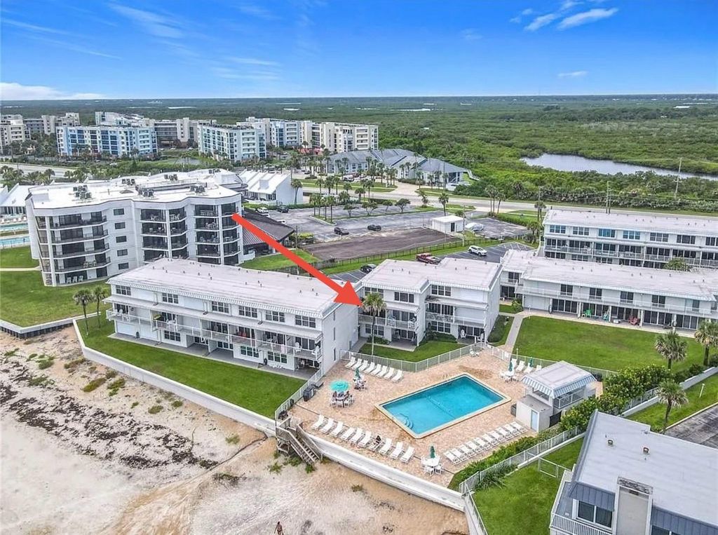 Photo of 4849 Saxon Drive #A204, New Smyrna Beach, FL 32169 (MLS # NS1085447)