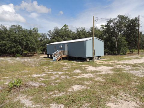 Photo of 10231 NE 87th Place, Bronson, FL 32621 (MLS # OM706853)