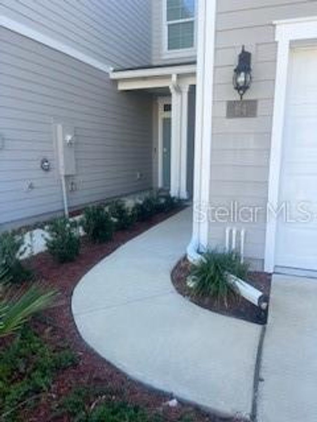 Photo of 64 Redbud Road, Palm Coast, FL 32137 (MLS # FC314700)