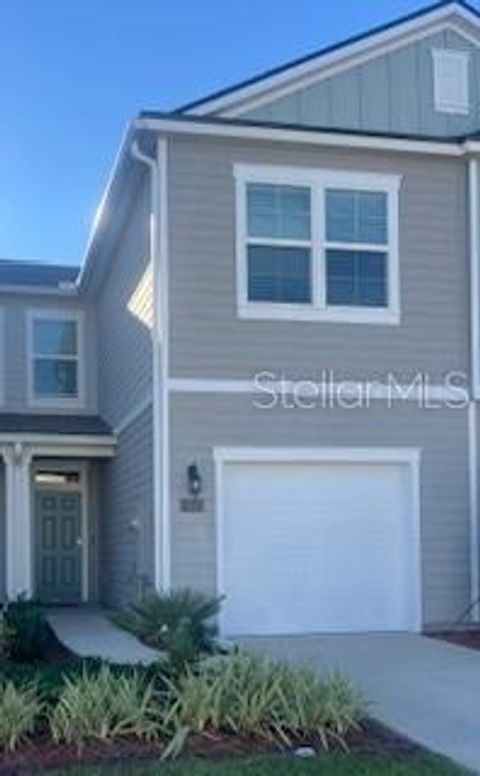 64 REDBUD ROAD PALM COAST FL 32137