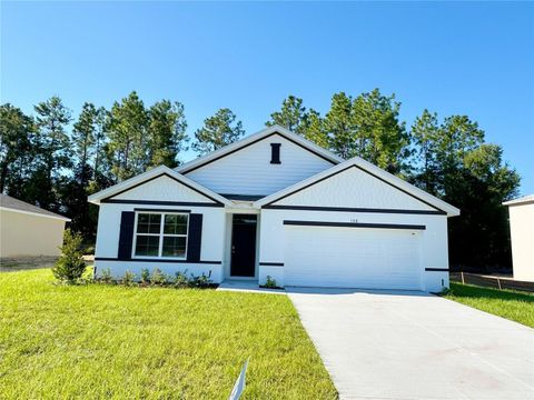 Photo of 136 Hickory Course Loop, Ocala, FL 34472 (MLS # O6412202)