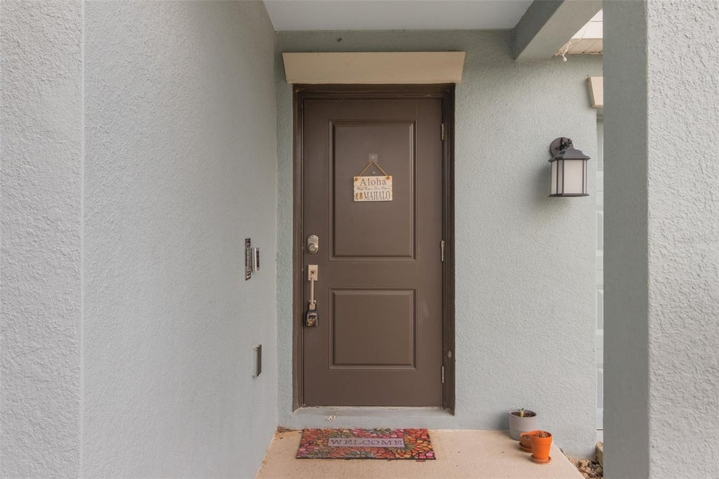 Photo of 621 Silver Palm Drive, Haines City, FL 33844 (MLS # O6429362)