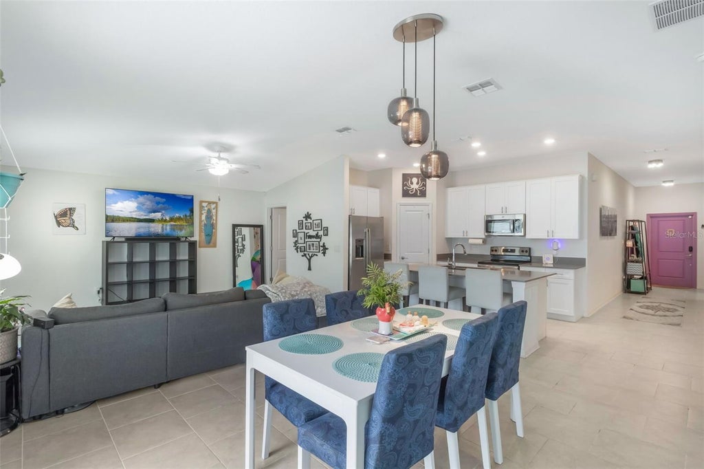 Photo of 621 Silver Palm Drive, Haines City, FL 33844 (MLS # O6429362)