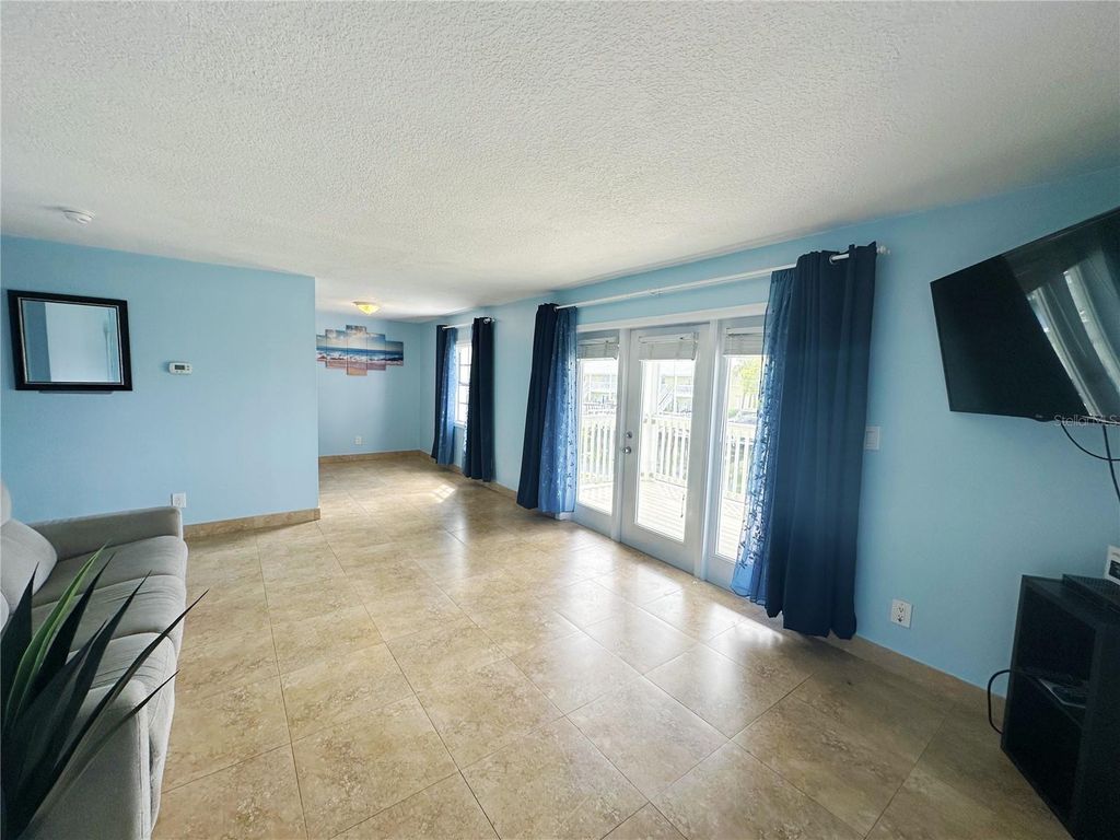 Photo of 4859 Coquina Key Drive SE #C, St Petersburg, FL 33705 (MLS # TB8424232)