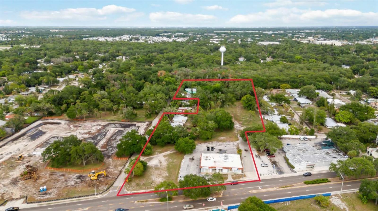 This is the largest tract left on the North Trail in Sarasota, Florida. There are 5 houses that can be purchased to make a total of plus or minus 5 Acres of land. The site has been approved for 135 units per acre recently. The site is in an amazing location considering the proximity to the Ringling School of Art, New College, Downtown Sarasota, as well as travel. The Sarasota International Airport is 5 minutes away. Currently the site is best used as a multi family site.