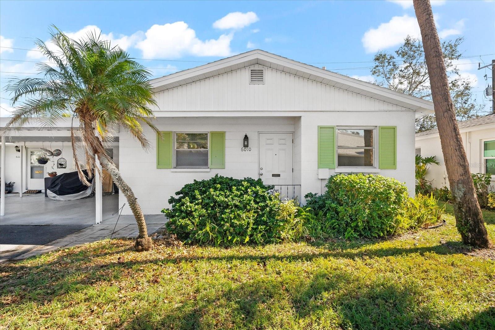 NO FLOOD ZONE- NO DAMAGE FROM STORMS! GREAT PRICE for a 2 bedroom, 2 bathroom TURN KEY FURNISHED VILLA in a 55+ community! Look no further as you have your own carport, beautiful heated pool, clubhouse with a kitchen, library and other activities. This is one of the largest condos in this community with extra air conditioned BONUS living space This community also ALLOWS ONE SMALL PET (maximum weight of 35 lbs) dog OR cat.Whether this will be your 2nd home for the winter or full time resident, this convenient location will be hard to beat! Located in Bradenton, this villa offers a convenient location with the Bayshore Gardens Shopping Center nearby. Here, you'll find everything you need on a regular basis, including grocery stores, Target, TJMaxx, banks, a fitness center, and various dining options. A public library is also within close proximity. For transportation, a public bus route is right at the corner, making it easy to explore the area. There are also plenty of nearby restaurants and entertainment options to enjoy. In addition to the convenient amenities, you'll find golfing, churches, and medical facilities nearby, as well as miles of beautiful beaches to explore. Only 8 miles to Anna Maria Island, Bradenton Beach, Holmes Beach and Coquina Key. Only 9 miles to Lido Beach and St Armands Circle in Sarasota! One of the top beaches in the world, Siesta Key is only 11 miles away. There are multiple state parks within 30 minutes as well. Location, Location, Location! Don't miss out on the opportunity to own this charming villa in a desirable location. Whether you're looking for a winter retreat or a permanent residence, this villa offers the perfect combination of comfort, convenience, and community.