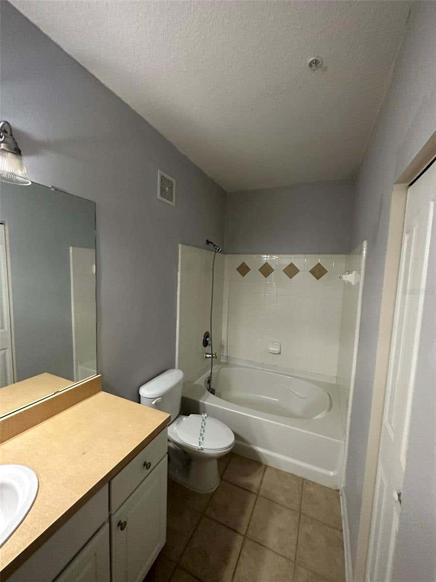 Photo of 6005 Newport Lane #103, Orlando, FL 32821 (MLS # S5154907)