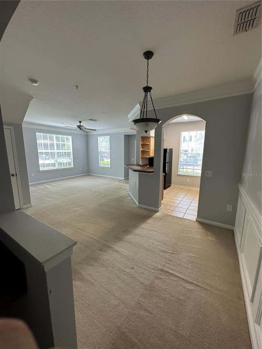 Photo of 6005 Newport Lane #103, Orlando, FL 32821 (MLS # S5154907)